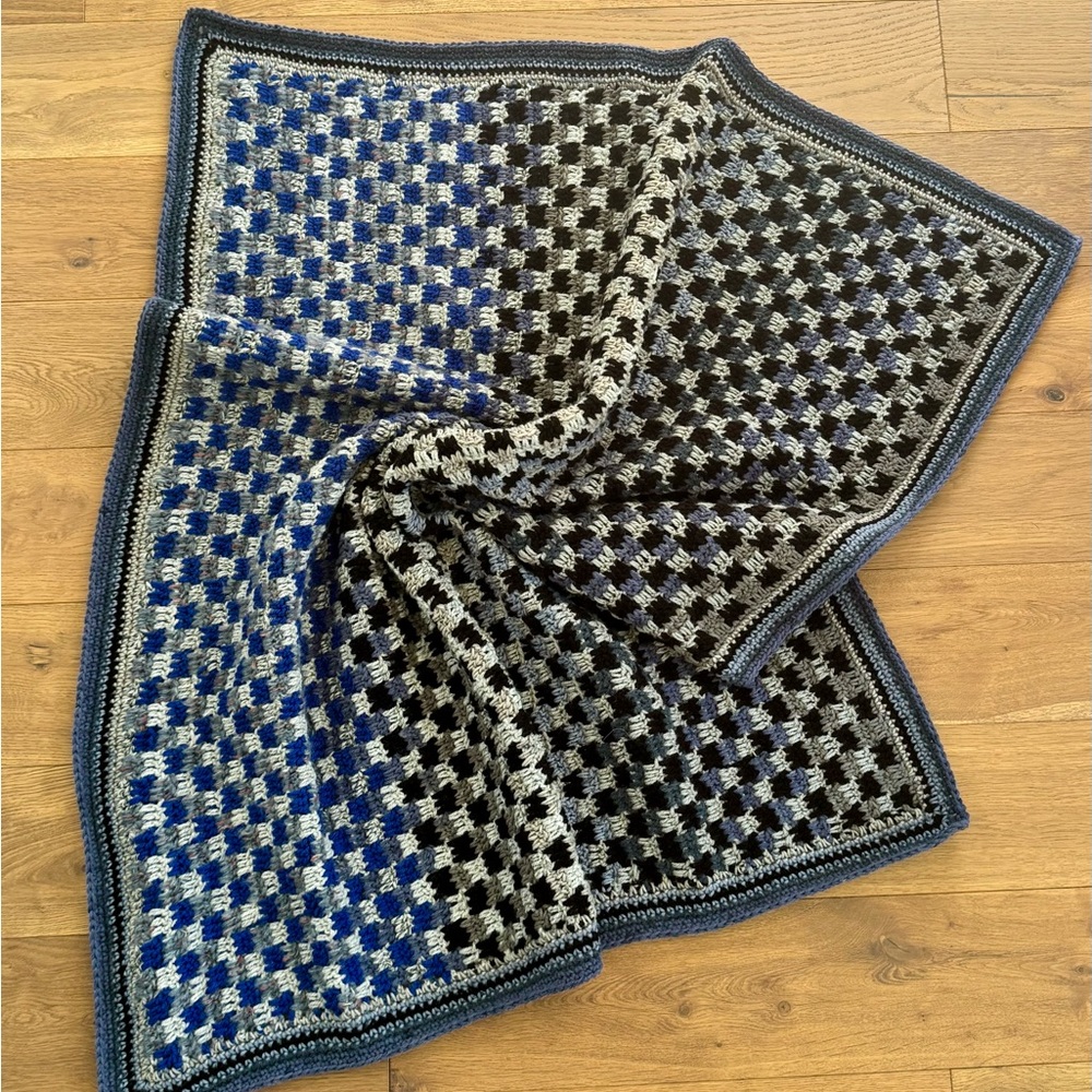 Blue and Black Checkered Knit Blanket
